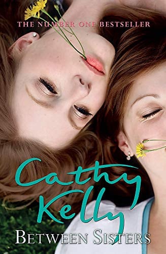 Between Sisters by Cathy Kelly - USED